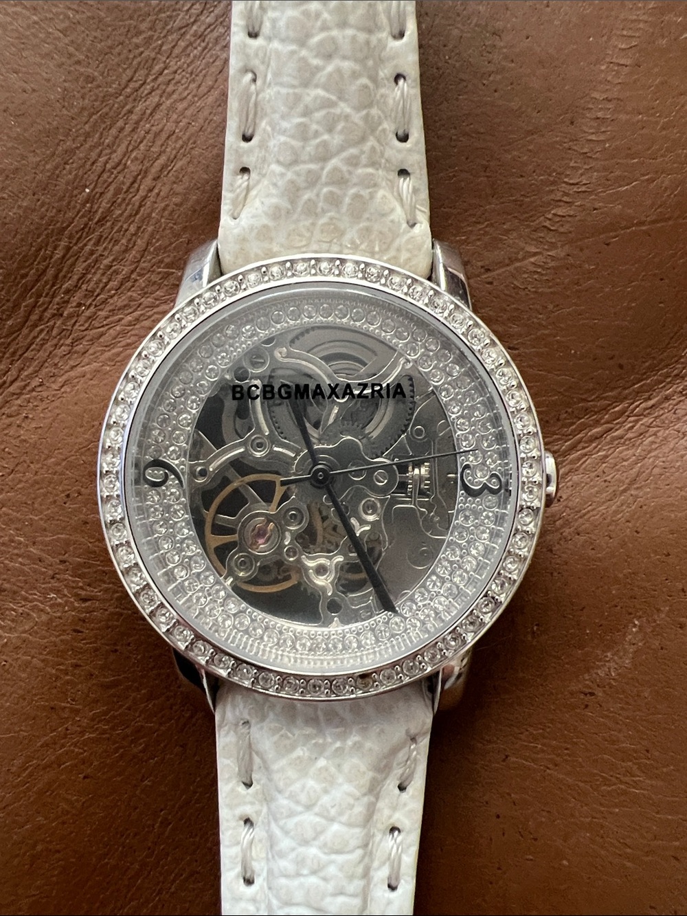 BCBGMAXAZRIA Women's Silver Skeleton Watch with White Leather Strap